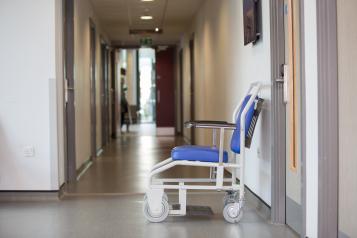 View of a hospital corridor with a wheelchair