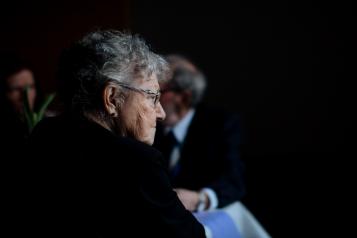 Selective focus photo of older woman with glasses