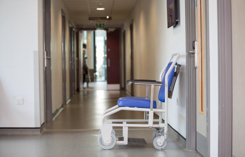 View of a hospital corridor with a wheelchair