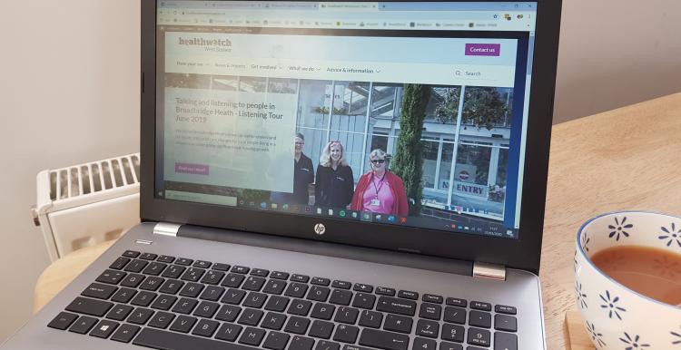 Laptop showing HWWS homepage