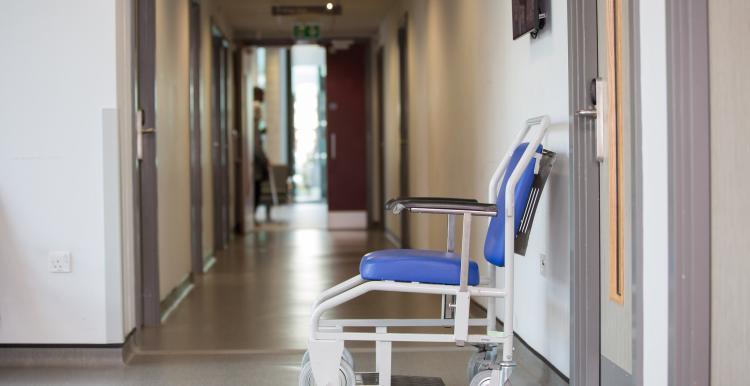 Empty hospital hall with wheelchair