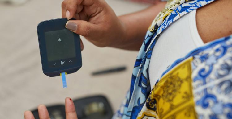 A lady checking here diabetes