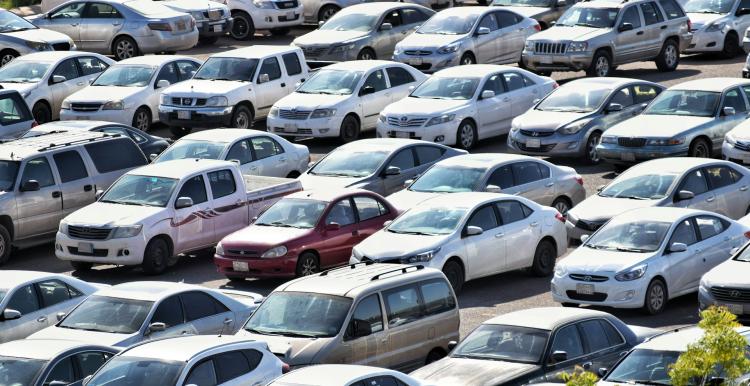 Image of many cars parked in a car park