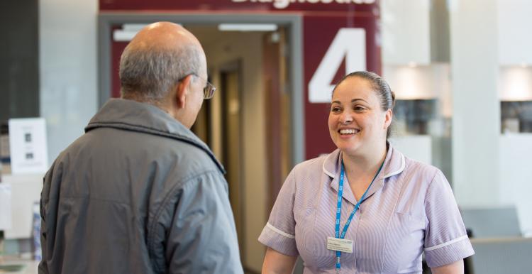 Nurse talking to patient
