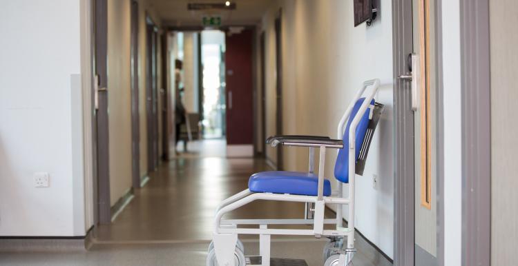 View of a hospital corridor with a wheelchair