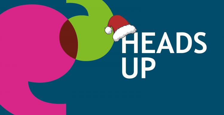Heads Up newspaper logo with Santa hat