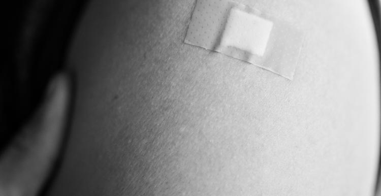 Arm with a plaster on