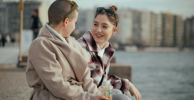 Two ladies chatting outside