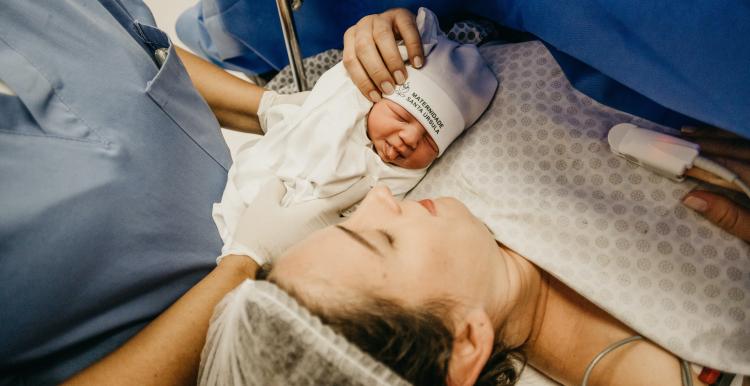 Mother and baby in delivery room