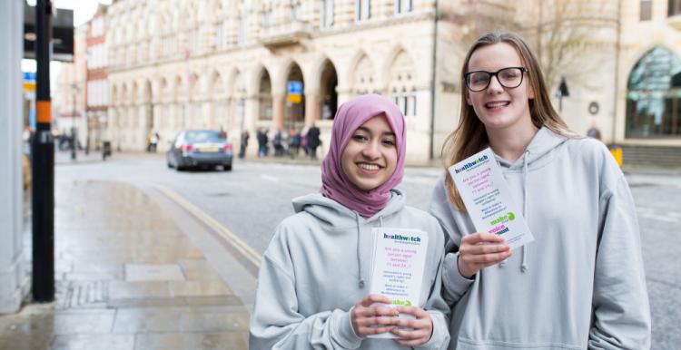 Two young people volunteering with Healthwatch.