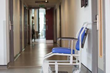 Empty hospital hall with wheelchair