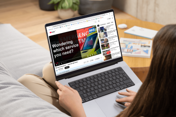 Lady watching range of NHS services video on her laptop