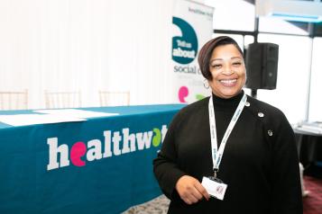 Lady from Healthwatch smiling at the camera