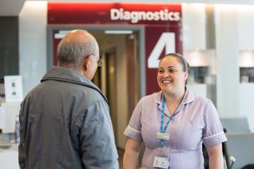 Nurse talking to patient