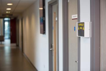 View of a hospital corridor with closed doors