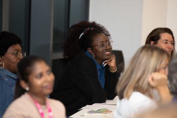 People listening in a meeting