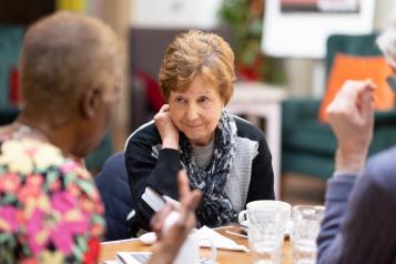 Lady talking at a community event