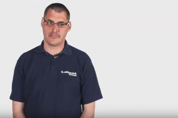 Screen shot of man in video