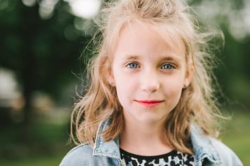 Young girl smiling at camera 