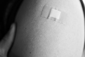 Arm with a plaster on