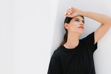 Woman hiding from the sun