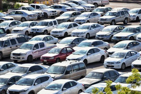 Image of many cars parked in a car park