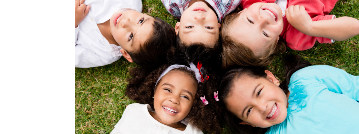 Children laying on the ground
