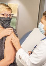 Woman getting her vaccination 
