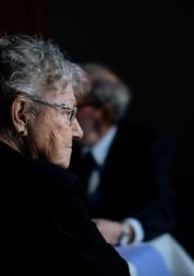 Selective focus photo of older woman with glasses